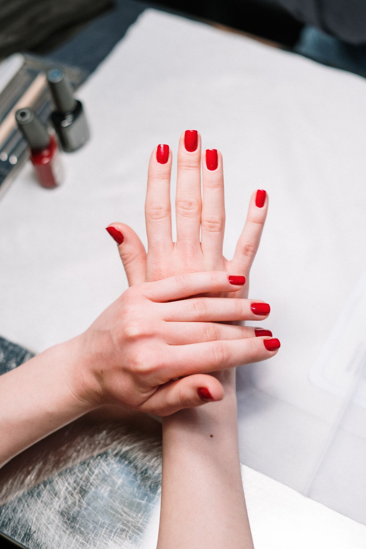 Finished red manicure, First Class Nails and Spa style