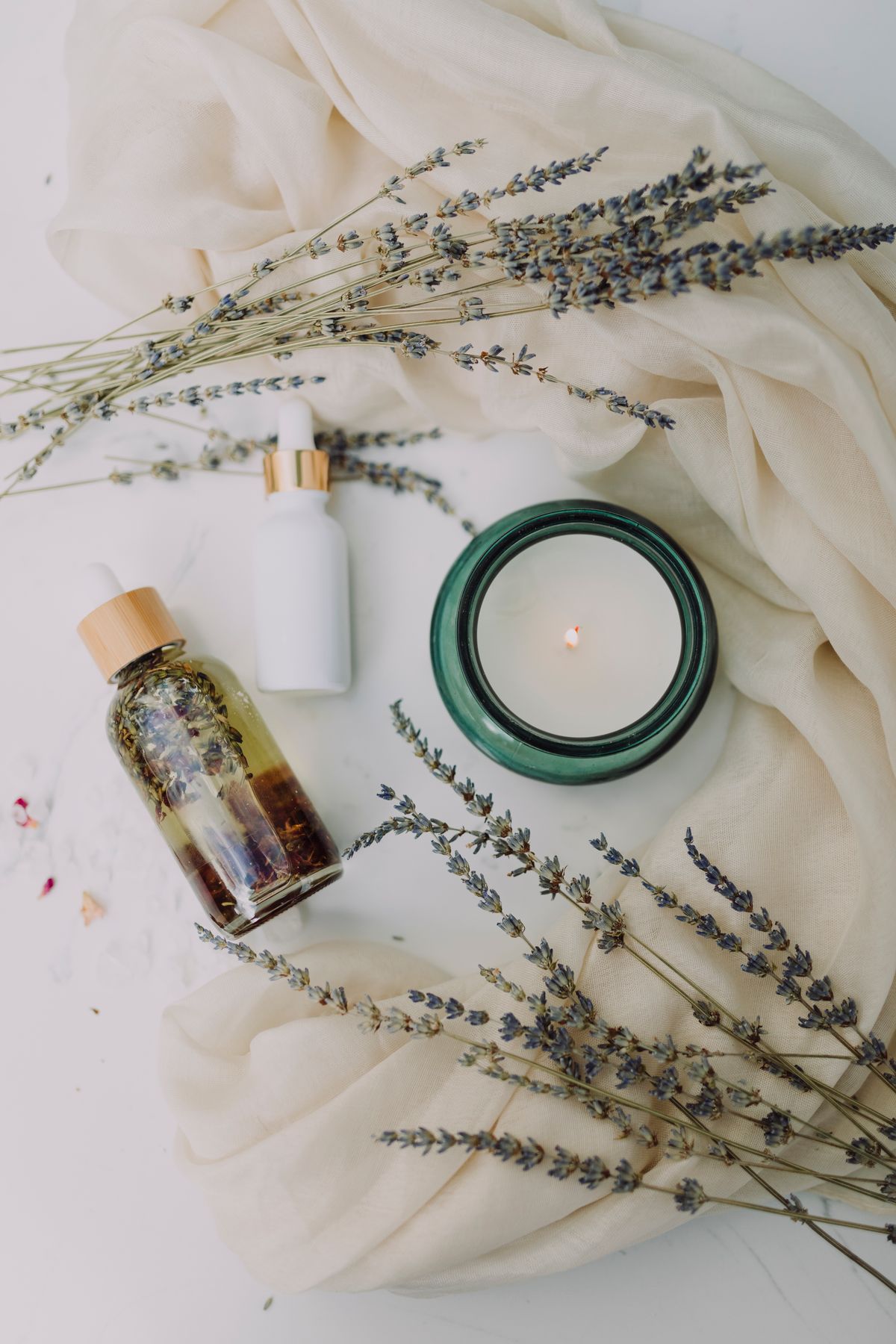 Calm spa ambiance with candle, First Class Nails and Spa